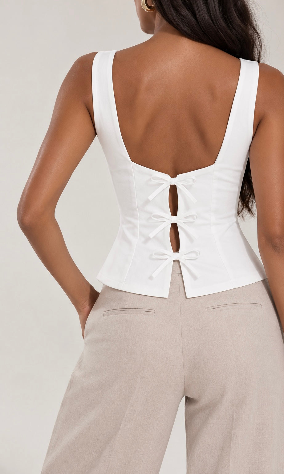 Peplum Top with Back Bow Neckline